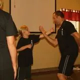 youg girl learning wing chun tan sau
